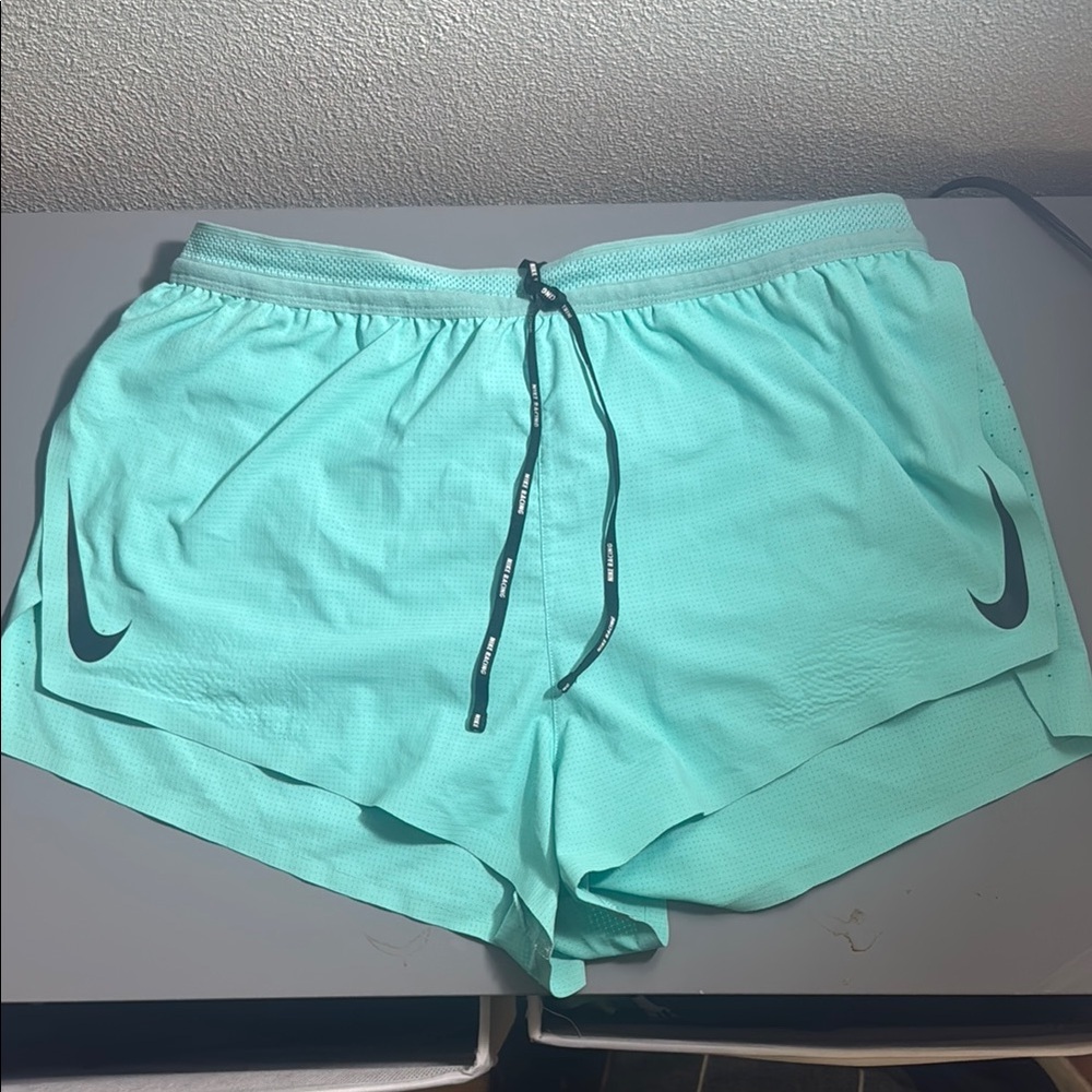 Nike Aeroswift 2” split running shorts.